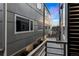 Modern home exterior featuring a balcony and sleek architectural details at 4469 Tennyson St # 15, Denver, CO 80212