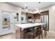 Stylish kitchen boasts a center island with seating, stainless steel appliances, and modern lighting at 4469 Tennyson St # 15, Denver, CO 80212