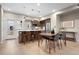 Eat-in kitchen features stainless steel appliances, a large island, and sleek countertops at 4469 Tennyson St # 15, Denver, CO 80212