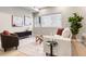 Cozy living area with stylish decor, including contemporary furniture and a patterned rug at 4469 Tennyson St # 15, Denver, CO 80212