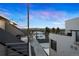 Enjoy the sunset from this roof deck with string lights and mountain views at 4469 Tennyson St # 15, Denver, CO 80212