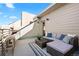 Spacious rooftop deck with modern outdoor furniture at 4469 Tennyson St # 15, Denver, CO 80212