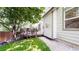 A backyard features a beautiful deck, lawn, and walkway at 13673 Cook St, Thornton, CO 80602