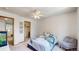 Bedroom with a ceiling fan, and blue sea turtle themed bedding at 13673 Cook St, Thornton, CO 80602