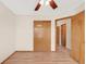 Bright bedroom features natural light, wood floors and a large closet at 205 Hawthorn St, Frederick, CO 80530