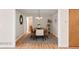 Formal dining room featuring wood table, seating for six, and chandelier lighting at 205 Hawthorn St, Frederick, CO 80530