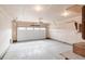 View of the large two car garage with lights at 205 Hawthorn St, Frederick, CO 80530
