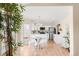 Bright kitchen features stainless steel appliances, a breakfast nook, and hardwood floors at 205 Hawthorn St, Frederick, CO 80530