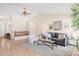 Bright and airy living room with vaulted ceilings and hardwood floors at 205 Hawthorn St, Frederick, CO 80530
