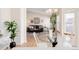 View of open living room and dining nook with access to additional seating area at 205 Hawthorn St, Frederick, CO 80530