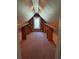 Finished attic with carpet flooring, built-in shelves and a window view at 6375 E 6Th Avenue Pkwy, Denver, CO 80220