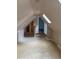 Unique attic space with built-in shelving and storage nooks at 6375 E 6Th Avenue Pkwy, Denver, CO 80220