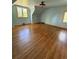 Large bedroom featuring hardwood floors, good natural light and sloped ceilings at 6375 E 6Th Avenue Pkwy, Denver, CO 80220