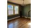 Dining room with hardwood floors, large windows, and chandelier at 6375 E 6Th Avenue Pkwy, Denver, CO 80220