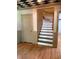 View of the staircase and hardwood floors at 6375 E 6Th Avenue Pkwy, Denver, CO 80220