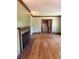 Cozy living room with a fireplace and hardwood floors at 6375 E 6Th Avenue Pkwy, Denver, CO 80220