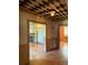 Spacious living room featuring hardwood floors and a fireplace at 6375 E 6Th Avenue Pkwy, Denver, CO 80220
