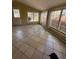 Sun-drenched sun room featuring many windows and an exit door at 6375 E 6Th Avenue Pkwy, Denver, CO 80220
