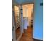 Organized walk-in closet featuring custom shelves, and ample storage space at 6375 E 6Th Avenue Pkwy, Denver, CO 80220