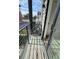 Cozy balcony featuring a chair and view of the street, offering a relaxing outdoor space at 1472 Yates St, Denver, CO 80204