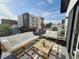 Spacious balcony with seating, creating an ideal spot for relaxation and outdoor enjoyment at 1472 Yates St, Denver, CO 80204