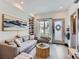Cozy living room with a modern design, featuring comfortable seating and ample natural light at 1472 Yates St, Denver, CO 80204
