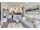 Inviting living room flows into a modern kitchen, creating an open and airy living space at 1472 Yates St, Denver, CO 80204