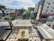 Relax on this amazing rooftop deck featuring comfortable outdoor seating and city views at 1472 Yates St, Denver, CO 80204
