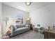 Neutral bedroom offering a flexible space for children, complete with natural light and cozy carpet for playing or relaxing at 1022 Spruce St, Denver, CO 80230