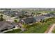 Aerial view of home with landscaping and a charming wooden fence in a suburban neighborhood at 11259 Kalispell St, Commerce City, CO 80022