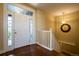 Inviting foyer features wood floors and stairs to the second floor at 11259 Kalispell St, Commerce City, CO 80022