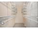 Walk-in closet with custom adjustable shelving at 1832 Simms St, Lakewood, CO 80215