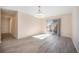 Dining room with vinyl flooring and sliding glass doors at 1832 Simms St, Lakewood, CO 80215