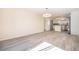 Bright dining room with a view to the kitchen at 1832 Simms St, Lakewood, CO 80215