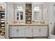 Spacious bathroom with double sinks, white cabinets, and ample counter space at 1489 Steele St # 310, Denver, CO 80206