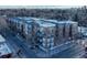 Charming brick apartment building with private balconies on a tree lined city street at 1489 Steele St # 310, Denver, CO 80206