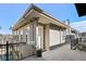Inviting outdoor patio with wrought iron railing and exterior access to the home at 1489 Steele St # 310, Denver, CO 80206