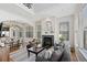 Inviting living room with fireplace, comfortable seating, and an open concept layout at 1489 Steele St # 310, Denver, CO 80206