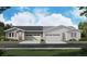 Charming duplex showcases stylish stonework, modern garage doors, and professional landscaping at 6606 N Nepal St, Aurora, CO 80019