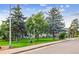 Building exterior with landscaping and street view at 13606 E Bates Ave # 208, Aurora, CO 80014