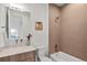 Cozy bathroom featuring a tub and shower combination with modern tile and a sleek sink at 4445 Wolff St, Denver, CO 80212