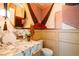 Chic powder room showcasing a marble vanity, artistic wallpaper, and contemporary fixtures at 4445 Wolff St, Denver, CO 80212