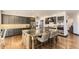 Gourmet kitchen featuring a large center island, granite countertops, stainless steel appliances, and ample cabinet space at 5352 Pinyon Jay Rd, Parker, CO 80134