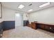 Finished basement space featuring dark wood trim, carpet, and recessed lighting at 8445 Lamar Dr, Arvada, CO 80003