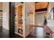 Warm entryway with wood accents, slate flooring, and built-in shelving, creating a cozy and inviting welcome at 116 Ramona Rd, Golden, CO 80403