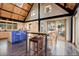 Stylish kitchen features an island with blue tiling, wooden cabinets, dark floors, and an open design at 116 Ramona Rd, Golden, CO 80403
