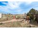 Backyard patio and entertaining area with fire pit and seating area at 34280 Columbine E Trl, Elizabeth, CO 80107