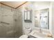 Clean bathroom with a glass shower, toilet, and vanity at 34280 Columbine E Trl, Elizabeth, CO 80107