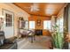 Spacious bonus room with vintage pinball machine and backyard access at 34280 Columbine E Trl, Elizabeth, CO 80107