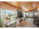 Bright living room with scenic views and entertainment center at 34280 Columbine E Trl, Elizabeth, CO 80107